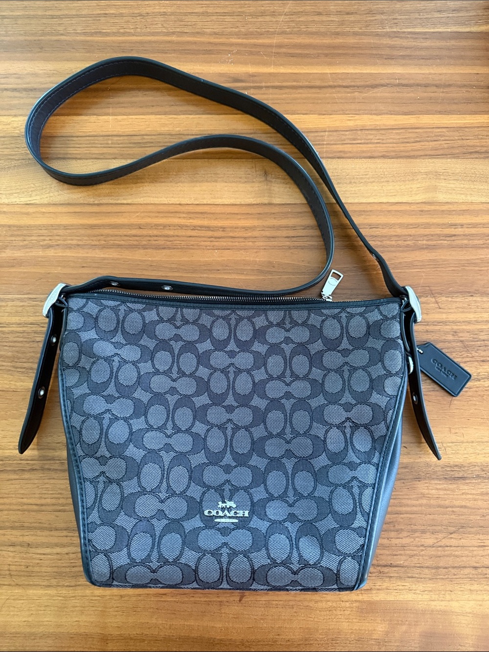 Like new Coach signature jacquard small dufflette crossbody